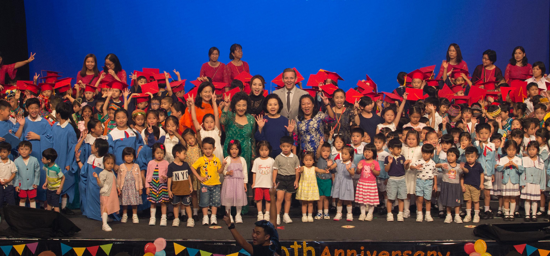 This is the banner for home page, a girl from Funful Kindergarten & Children's Corner is smiling to you.